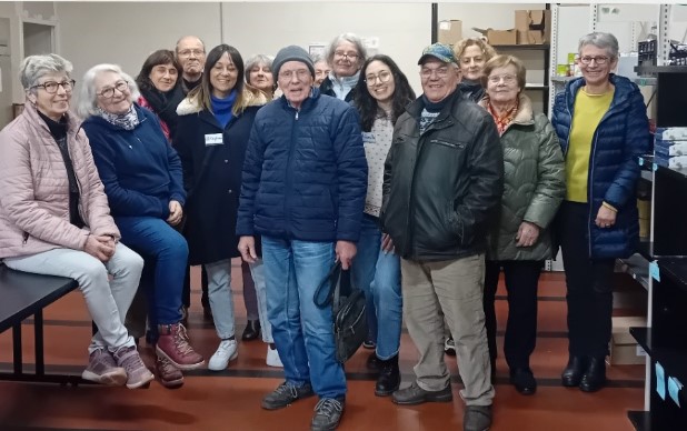 Bénévoles des Restos du Coeur et des salariés de Teisseire pour un temps de bénévolat conjoint